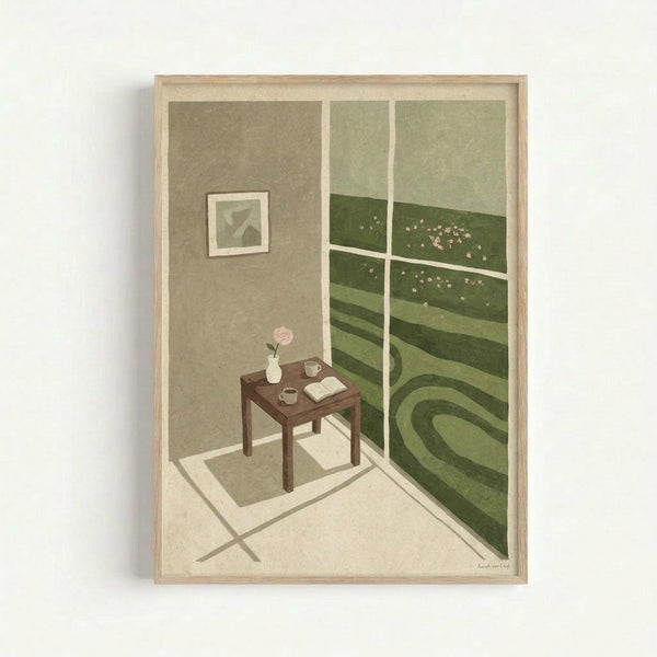 May include: Framed artwork showing a minimalist interior scene with a dark wooden table holding a pink flower in a vase, teacup, and open book. The room has beige walls with a small framed picture, large window overlooking rolling green hills dotted with small white flowers or sheep, and cream colored floors. The illustration uses muted earth tones and has a peaceful, contemplative mood in a light wood frame against a white wall.