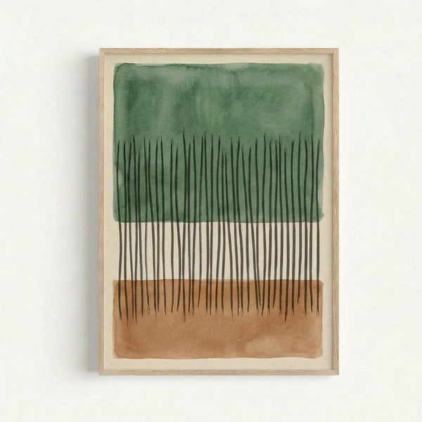 Framed abstract watercolor artwork featuring vertical black lines resembling grass or reeds extending downward from green and brown watercolor washes at top and bottom. The piece is displayed in a light wood frame against a white wall, creating soft shadows. The watercolor has organic, flowing edges with natural paint bleeding effects.