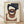 May include: Framed abstract geometric art print with overlapping shapes in navy blue, terracotta brown, and cream colors on textured beige background. Wooden frame sits on light wood flooring against white wall with natural lighting creating soft shadows.