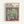 May include: A framed Henri Matisse exhibition poster displayed on a white wall. The artwork shows an open window scene with vibrant colors - turquoise window frames opening to reveal lush green tropical plants and palm fronds, with a pink table holding a yellow teacup and blue potted plant. The composition features bold brushstrokes in blues, greens, oranges, and reds typical of Matisse's Fauvist style. Text reads "HENRI MATISSE" and "NATIONAL GALLERY OF MODERN ART" at the top. Natu