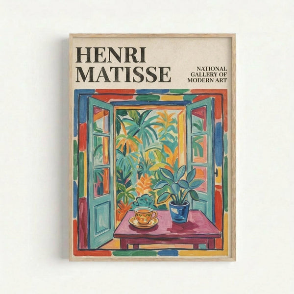May include: A framed Henri Matisse exhibition poster displayed on a white wall. The artwork shows an open window scene with vibrant colors - turquoise window frames opening to reveal lush green tropical plants and palm fronds, with a pink table holding a yellow teacup and blue potted plant. The composition features bold brushstrokes in blues, greens, oranges, and reds typical of Matisse's Fauvist style. Text reads "HENRI MATISSE" and "NATIONAL GALLERY OF MODERN ART" at the top. Natu