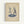 May include: Framed poster print hanging on white wall showing minimalist line art illustration of two people dancing on top of a turntable record player, drawn in blue tones on cream colored background with light wood frame