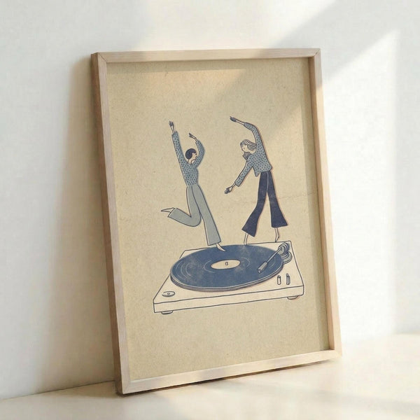 May include: Framed minimalist line art print leaning against white wall, showing two dancing figures in blue and gray tones standing on a turntable record player, displayed in light wood frame on beige textured paper background