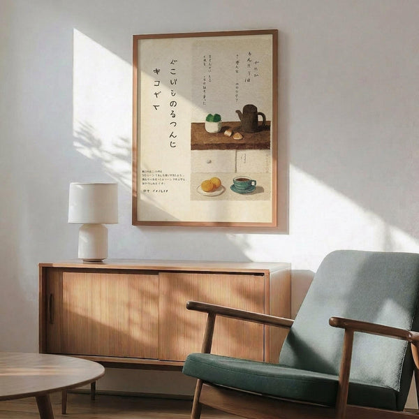 May include: Japanese calligraphy art print in wooden frame displayed above mid-century modern walnut credenza with white table lamp. Green upholstered armchair with wooden frame visible in corner. Artwork features Japanese text with illustrated tea items including teapot, cup, and food on shelves against cream background. Bright natural light casts shadows across white wall in minimalist room setting.
