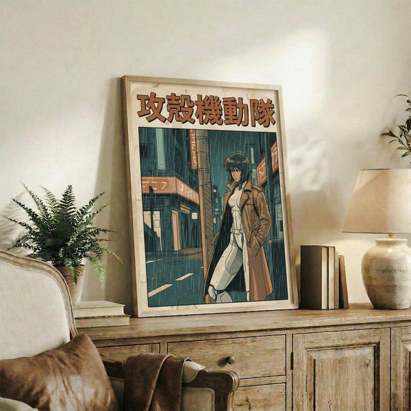 May include: Framed anime-style poster featuring a character in a brown trench coat standing in a rainy urban street scene with teal and turquoise tones and Japanese text at the top, displayed on a rustic wooden sideboard alongside books, a ceramic vase, and fern plant in a cozy living room with beige armchair and warm lighting