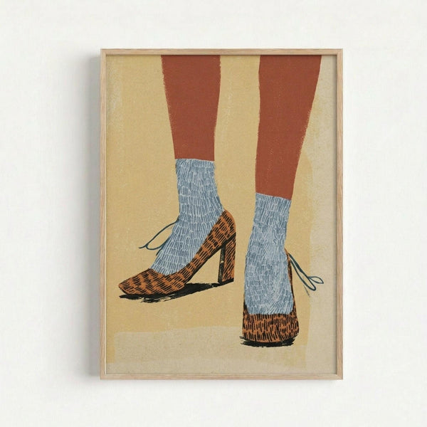 Framed illustration showing a pair of legs wearing blue cable-knit socks and brown leopard print high heels with ankle straps against a cream background. The legs are painted in warm terracotta and pale yellow tones. The artwork is displayed in a light wood frame hanging on a white wall, featuring a mid-century modern artistic style with bold colors and simplified forms.