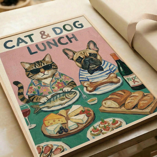 May include: Vintage-style poster print displayed on white paper showing a tabby cat in floral shirt and sunglasses alongside a French bulldog in striped shirt at a lunch table. Pink and green illustration features various foods including fish, bread, cheese, and wine bottle in retro art style.