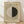 May include: Framed poster print leaning against white wall on light wood floor. Features beige background with circular design split between cream and black halves, small horizontal lines through center. Text reads "HILMA af Klint" at top with small red triangle accent, exhibition details at bottom. Natural wood frame, soft lighting creates diagonal shadows across scene.