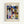 Framed abstract geometric art poster featuring Paul Klee's colorful composition with overlapping triangular shapes in blues, yellows, oranges, and greens at top, and angular architectural forms with circles and rectangles below. The artwork combines watercolor-like textures with bold geometric patterns. Text reads "PAUL KLEE" at top and "BAUHAUS GRAND MASTERS COLLECTION" in upper right, with "BAUHAUS ARCHIV JUBILÄUM 1919-2019" at bottom. Light wood frame against white wall.