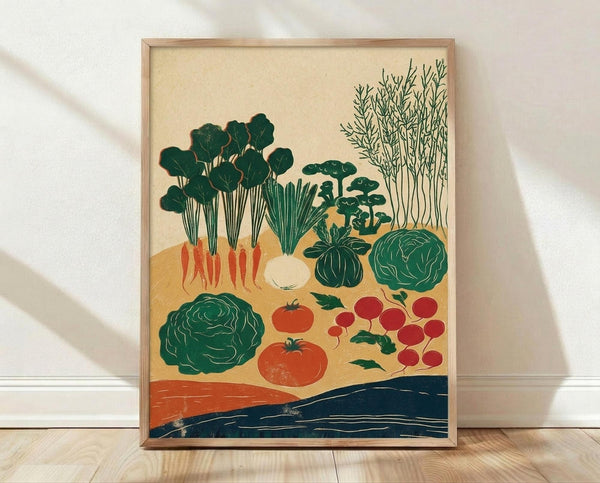 May include: Framed botanical illustration print leaning against white wall on light wood floor. Artwork features various vegetables including leafy greens, carrots, tomatoes, cabbage, radishes, and herbs in green, red, and orange colors against cream background with decorative blue and orange wave elements at bottom. Natural wood frame with simple design.
