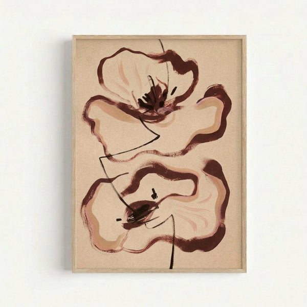 Framed abstract floral artwork featuring two stylized poppy flowers in earthy brown and beige tones on cream background. The flowers have flowing, organic shapes with dark centers and loose brushstroke-style outlines. Thin black stems connect the blooms. The piece is displayed in a light wood frame against a white wall, showing visible texture and warm, muted color palette throughout.
