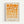 May include: Framed geometric art print with orange and cream colored circles and semicircles arranged in a grid pattern, displayed on a light gray wall. The minimalist design features warm orange tones graduating from bright to pale, with "BAUHAUS 1923" text below the composition. Natural wood frame surrounds the cream-colored background.