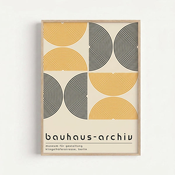 Framed geometric poster with repeating semicircular patterns in alternating orange and black concentric lines on cream background. Features four quadrants with curved forms creating rhythmic visual movement. Minimalist typography below reads "bauhaus-archiv" and "museum für gestaltung klingelhöferstrasse, berlin" in lowercase sans-serif font. Light wood frame against white wall.