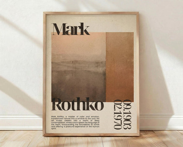 May include: Framed poster print featuring Mark Rothko's name in large black serif letters, abstract landscape painting in warm brown and orange tones, biographical text about the artist, and birth-death years 1903-1970. Light wood frame rests against white textured wall on wooden floor with soft natural lighting casting shadows.