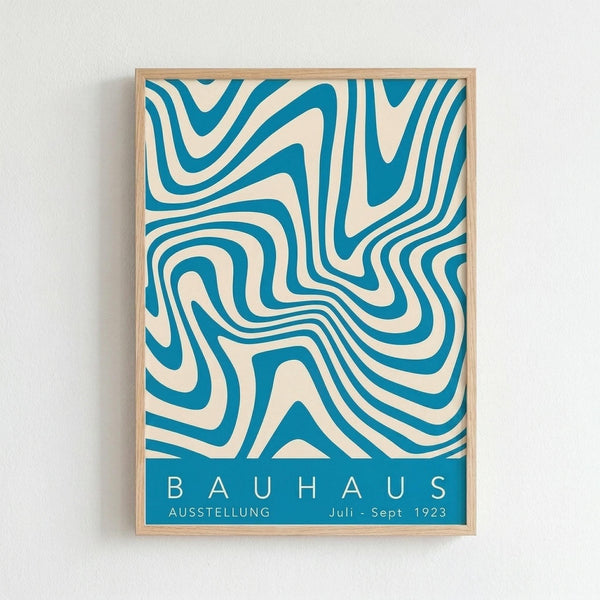 May include: Framed vintage-style poster with flowing teal and cream wavy stripes creating an optical illusion effect, displayed on white textured wall. Light wood frame surrounds the geometric design with "BAUHAUS" and "AUSSTELLUNG Juli-Sept 1923" text at bottom in white letters on teal background.