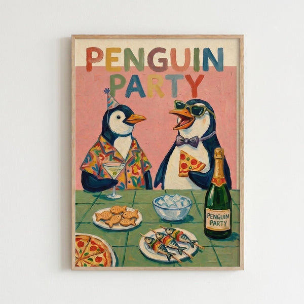 Colorful illustrated poster in wooden frame showing two cartoon penguins at a party table. One penguin wears a party hat and tropical shirt while holding a martini, the other wears sunglasses and bow tie holding pizza. Table displays fish, cookies, ice bowl, pizza slices, and champagne bottle labeled "Penguin Party." Text "PENGUIN PARTY" appears in rainbow letters against cream and coral pink background. Playful, whimsical art style with vibrant colors.