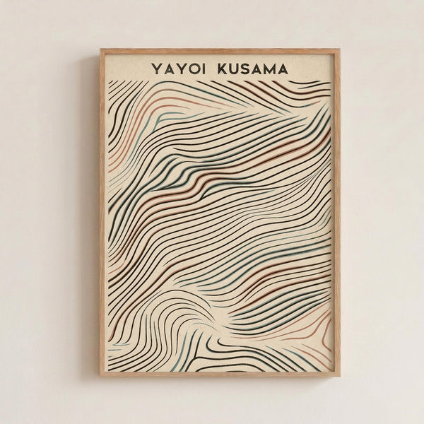 May include: Framed art print hanging on white wall featuring flowing wave-like lines in black, rust red, and teal colors on cream background. The organic curved lines create a dynamic swirling pattern reminiscent of topographical maps or flowing water. Natural wood frame complements the earthy color palette. Artist name "YAYOI KUSAMA" appears in black text at top of print.