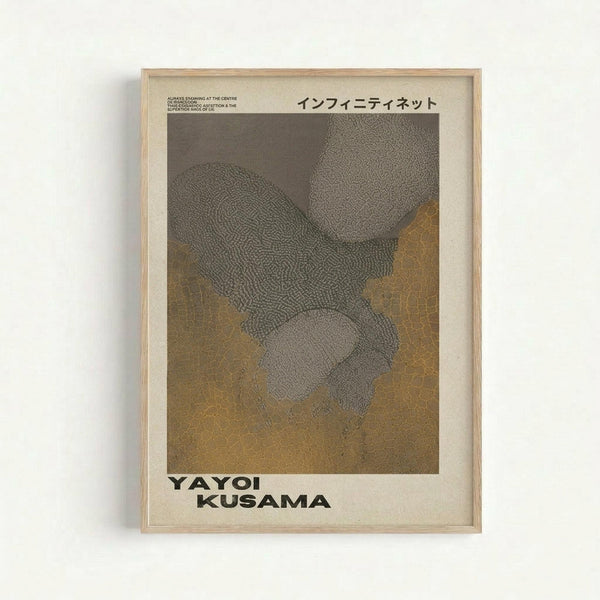 May include: Framed art print hanging on white wall showing abstract organic shapes in gray and brown tones with textured, cellular-like pattern. Text in Japanese characters appears at top, with "YAYOI KUSAMA" in bold letters at bottom. Light wood frame with white matting surrounds the artwork.