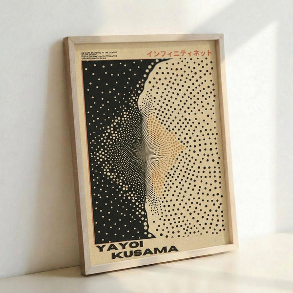 May include: Framed poster featuring a black and cream halftone dot pattern creating an abstract flowing design, displayed in a light wooden frame leaning against a white wall. The artwork shows varying sized dots that transition from dense black areas to lighter cream sections, creating a dynamic wave-like movement across the composition.