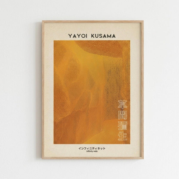 May include: Framed art print hanging on white wall featuring orange abstract composition with dotted wave-like patterns. Artwork has cream matting in light wood frame with "YAYOI KUSAMA" text at top and Japanese characters vertically along right side. Bottom shows "インフィニティネット infinity nets" in black text.