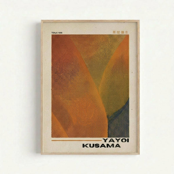 Framed exhibition poster featuring abstract curved forms in warm orange, yellow, and olive green tones created with halftone dot patterns. The artwork shows flowing, organic shapes with varying dot densities creating depth and movement. Text reads "Tokyo 1998" at top with Japanese characters, and "YAYOI KUSAMA" at bottom. Displayed in light wood frame with cream matting against white wall.
