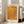 May include: Framed art print with orange dotted pattern artwork displayed on wooden floor against white wall next to beige upholstered sofa. Print features warm golden orange background with intricate dotted texture, Japanese text characters on right side, and title text at top and bottom. Light wood frame complements bright natural lighting from nearby windows.