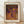 May include: Framed art print displayed on wooden floor against white wall with natural lighting. The artwork features an abstract composition with purple circular dots scattered across a textured orange-brown background with dotted patterns. Light wooden frame with cream matting. Japanese characters visible on right side of print along with "infinity nets" text at bottom.