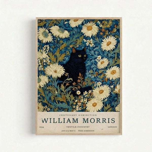 Framed vintage exhibition poster featuring a black cat with yellow eyes nestled among ornate blue and cream floral patterns with large white daisies. The decorative textile design shows intricate swirling foliage in blues, greens, and golds. Bottom text reads "Centenary Exhibition William Morris" with "1934 Textile Industry London Jan 6 to May 6 Free Admission" in smaller print. Light wood frame against white background.