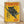 May include: Framed vintage-style poster with yellow background featuring a black panther with golden eyes perched on a tree branch. Bold red text reads "TOKYO" at top and "JAPAN WEEK" at bottom, with Japanese characters on left side. Date shows "12 FEBRUARY 1977 - EDITION 5/12". Light wooden frame displayed on wooden floor against white wall with natural lighting and shadows.