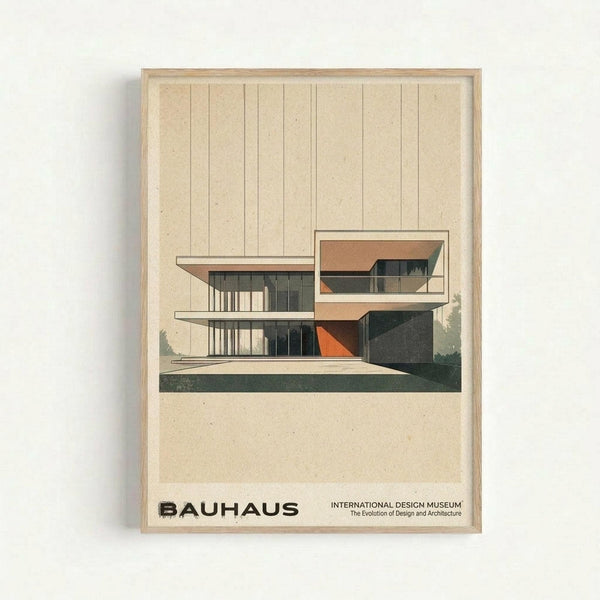 Framed modernist architectural poster featuring a geometric two-story building with clean lines, large windows, and cantilever balconies in muted tones of beige, orange, and dark green. The minimalist illustration sits centered on textured cream paper with vertical guidelines above and "BAUHAUS" text below, all within a light wood frame against a white wall.