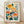 May include: Framed botanical poster print featuring stylized flowers in retro mid-century modern design with yellow sunflower, pink bloom, orange tulips, and teal leaves against cream background with colorful dotted patterns, displayed in natural wood frame leaning against white wall on light wooden floor