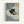 May include: Framed poster print hanging on white wall showing black cat with yellow eyes sitting on blue and white striped bedding next to coffee cup. Artwork has soft, illustrated style with muted colors. Light wood frame surrounds the print.