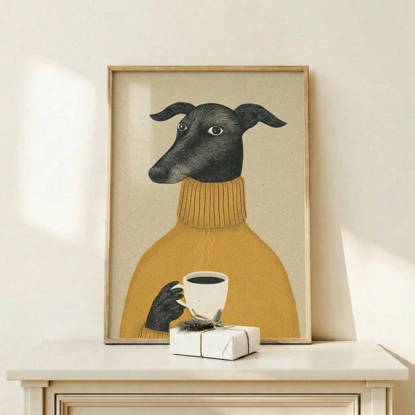 May include: Framed artwork showing a black greyhound wearing a mustard yellow ribbed turtleneck sweater, holding a white coffee cup with steam rising. The illustration uses crosshatched engraving style on cream background. Wood frame sits on light wooden shelf next to small white wrapped gift with evergreen sprig. Warm lighting creates soft shadows on neutral wall.