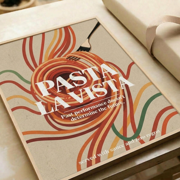 May include: Retro-style poster with swirling orange, red, and green pasta noodles forming dynamic curves across beige background. Large white text reads "PASTA LA VISTA" with smaller tagline below. Black fork illustration appears in upper portion. Print displayed in light wooden frame on white surface next to rolled kraft paper.