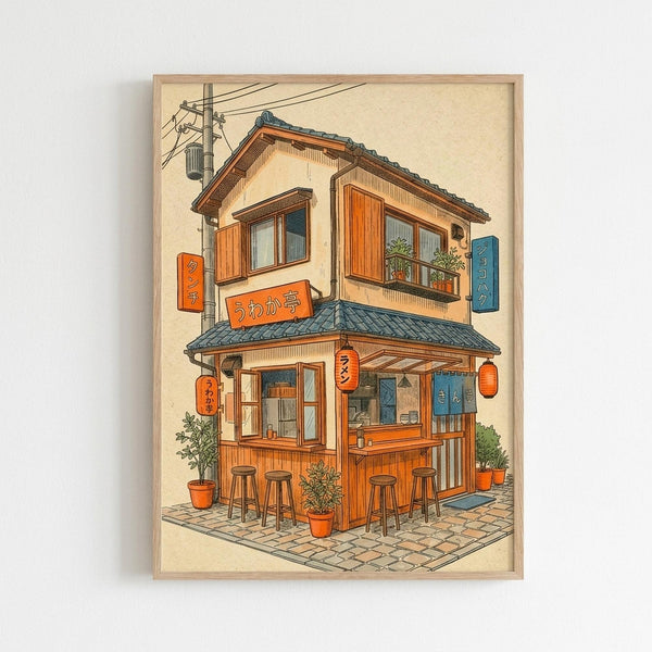 Framed illustration of a cozy two-story Japanese ramen shop with warm orange and brown wooden exterior, blue tile roof, and outdoor counter seating with wooden stools. The building features traditional architecture with Japanese signage in orange and blue, red paper lanterns, potted plants around the base, power lines above, and sits on a brick paved street. The artwork has a vintage poster style with cream background and is displayed in a light wooden frame against a white wall.