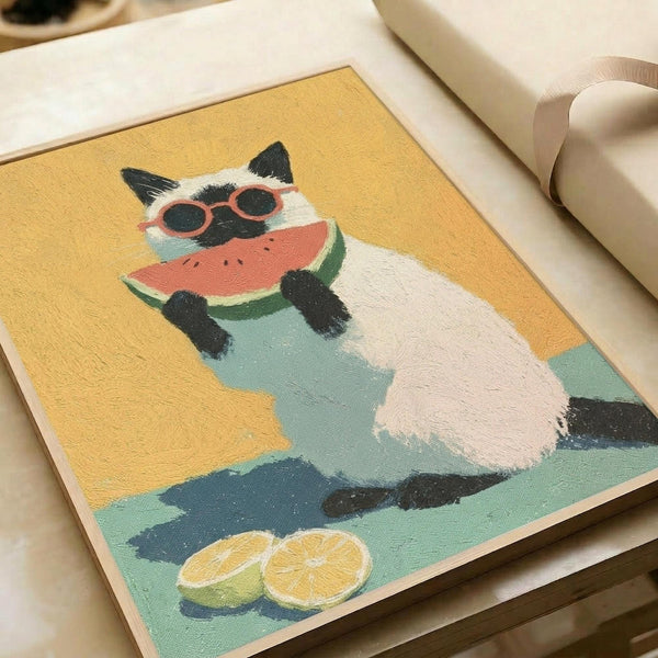 May include: Canvas print featuring a white Siamese cat wearing red sunglasses and holding a watermelon slice, painted in bright colors with yellow background and teal water elements, plus orange slices at bottom. Print sits on white fabric surface next to rolled white paper tube.