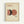 Framed minimalist poster with cream background featuring abstract geometric design of overlapping circles in dusty pink, terracotta orange, and charcoal black, with "MODERN REAL ESTATE" text at top and three small dots below the shapes, displayed in light wood frame against white wall