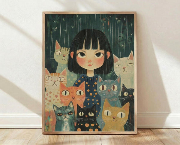 May include: Framed art print leaning against white wall on light wood floor. Illustration shows young girl with black bob haircut and rosy cheeks wearing navy polka dot dress, surrounded by eight cats in various colors - orange tabby, gray, white, blue-gray, black, and cream. Dark teal background with vertical rain lines and scattered leaves creates moody atmosphere. Natural wood frame visible.