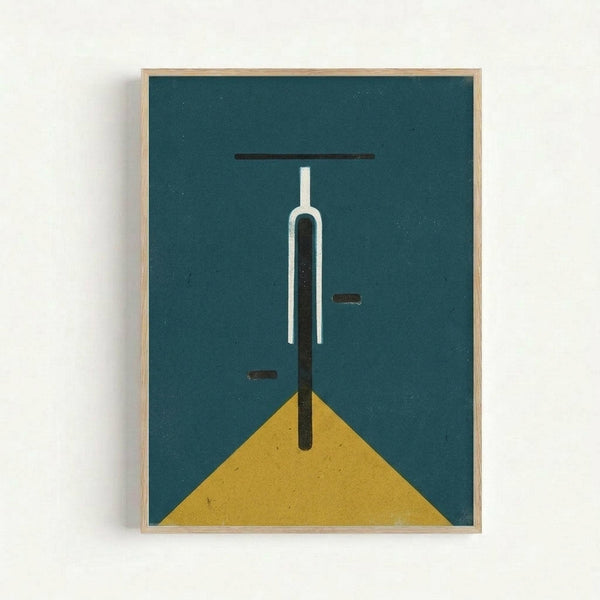 A minimalist geometric artwork in a wooden frame showing a stylized bicycle front view on a teal blue background. The design features a white and black bicycle fork emerging from a golden yellow triangular shape at the bottom, with simple black horizontal lines suggesting handlebars and frame elements.
