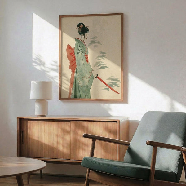 May include: Framed Japanese art print featuring a woman in mint green kimono with coral obi sash and red hair ornament, holding a katana sword, displayed on white wall above wooden sideboard with ceramic table lamp and mid-century modern sage green armchair in sunlit room