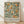May include: Framed poster with botanical illustration of orange fruit trees and green foliage on cream background, displayed against white textured wall on light wood floor. Vintage-style exhibition poster features William Morris textile industry design from 1934 London centenary show, with elegant typography below ornate fruit and flower pattern in warm oranges and forest greens.