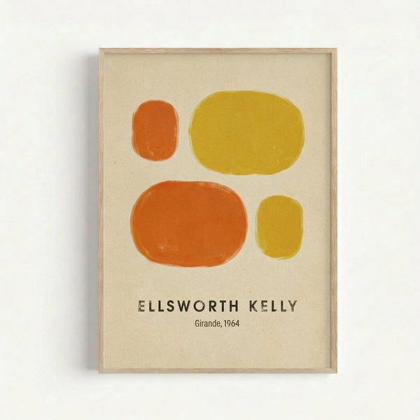 Framed abstract art print featuring four organic oval shapes in warm tones - two orange ovals on the left side and two yellow ovals on the right, arranged asymmetrically on a cream background. The shapes have soft, hand-painted edges with subtle color variations. Text below reads "ELLSWORTH KELLY" and "Girande, 1964" in simple black lettering. Light wood frame against white wall.