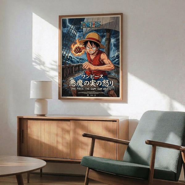 May include: Framed One Piece anime poster featuring Luffy in red vest and straw hat with flaming fist on stormy ship deck background, displayed above wooden sideboard with white ceramic lamp in modern living room with teal upholstered chair and natural lighting casting shadows on white wall.