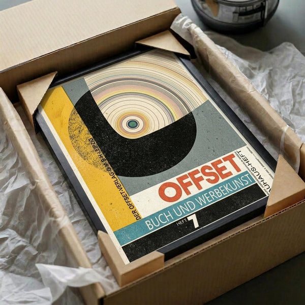 May include: Vintage Bauhaus poster print in black frame, packed in cardboard shipping box with protective tissue paper. Features geometric design with concentric circles forming an eye motif in cream, yellow, black and teal colors. German text reads "OFFSET BUCH UND WERBEKUNST HEFT 7" at bottom. Modernist 1920s typography and abstract graphic elements visible.