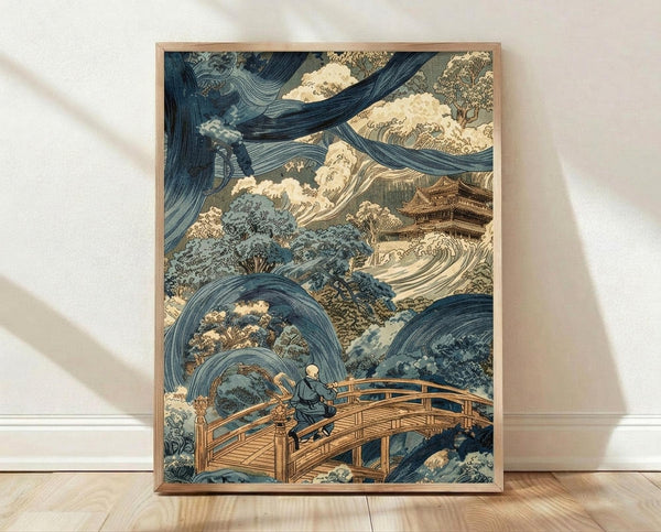 May include: Framed Japanese woodblock print artwork leaning against white wall on light wooden floor. The vintage-style print features dramatic swirling blue waves and wind patterns surrounding a small figure on a wooden bridge, with traditional architecture and trees visible in the background. Earth tones of blue, cream, and brown dominate the composition in classic ukiyo-e style, displayed in a thin wooden frame.