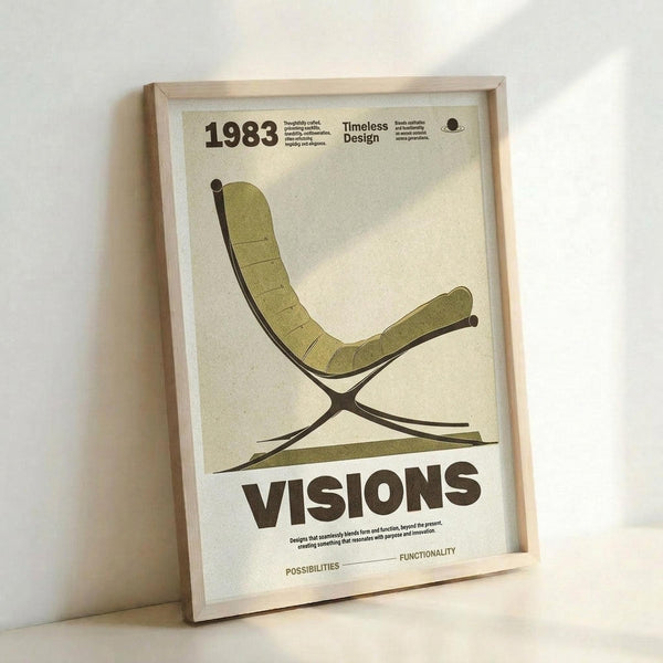 May include: Framed vintage-style poster featuring a minimalist green lounge chair illustration with curved X-frame base, displayed in natural wood frame against white wall. Cream background with retro typography reading "1983," "Timeless Design," and "VISIONS" in brown text. Mid-century modern aesthetic with clean lines and muted olive green upholstery details.