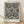 May include: Framed poster with black polka dot pattern on white background, text reading "YAYOI KUSAMA JAPAN 1945" below the artwork. Light wood frame with "modern art" text at top. Poster displayed on light wooden floor against white textured wall with soft natural lighting and shadows.