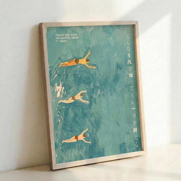 May include: Framed poster print leaning against white wall showing three swimmers diving through turquoise blue water with white splash effects. Features motivational text "Finish the race no matter what it takes" in English and vertical Japanese characters along right side. Light wood frame, watercolor-style artwork with minimalist aesthetic.