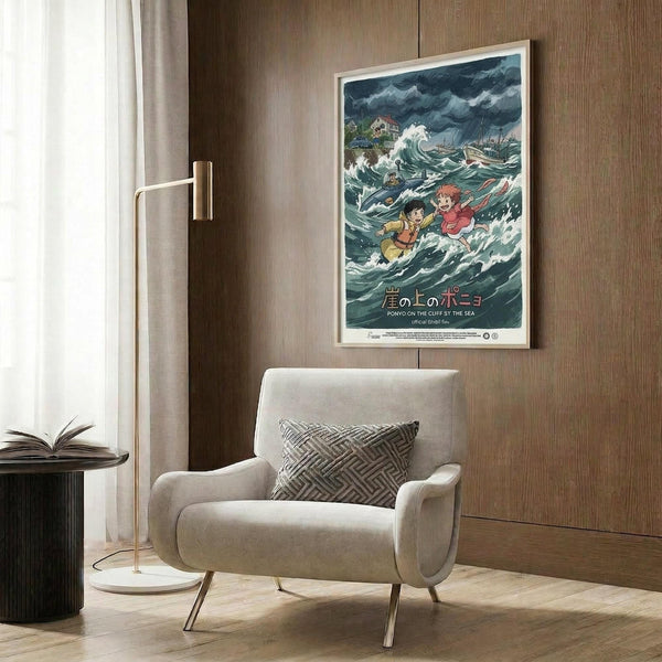 May include: Framed Studio Ghibli Ponyo movie poster mounted on wood-paneled wall above cream upholstered armchair with geometric pillow. Poster shows animated characters riding turbulent ocean waves during storm with dark cloudy sky and coastal buildings. Modern reading corner with brass floor lamp and small round table with open book. Natural lighting from window with sheer curtains.