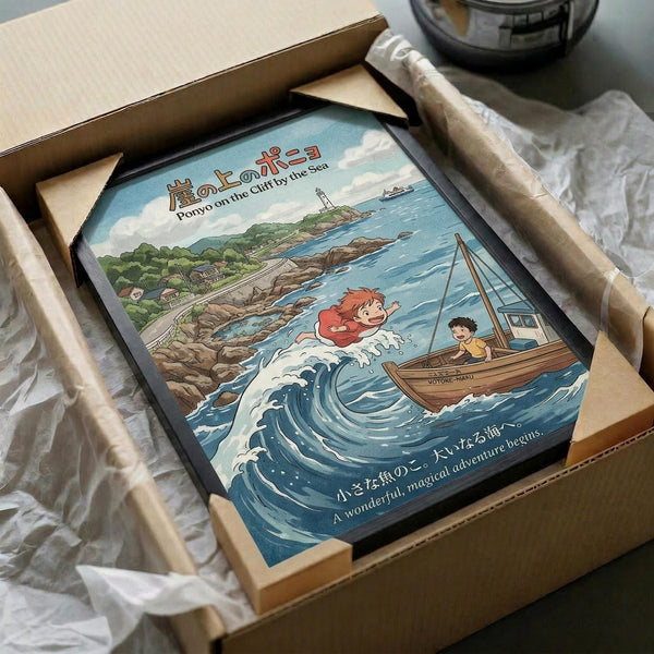 May include: Framed Studio Ghibli-style poster showing red-haired Ponyo swimming in ocean waves next to a wooden fishing boat with a boy, lighthouse on rocky coastal cliff in background, Japanese and English text, displayed in wooden frame inside cardboard shipping box with protective wrapping paper